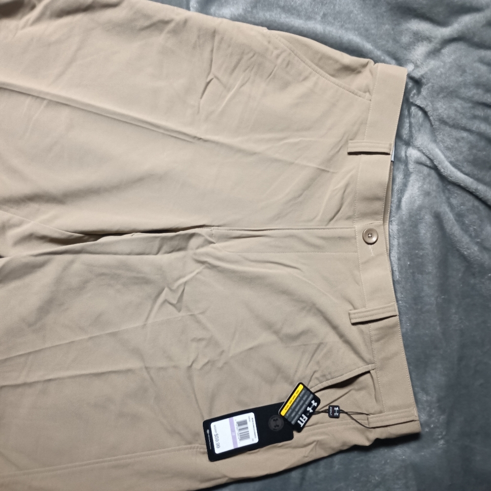 Under Armour tan shorts.